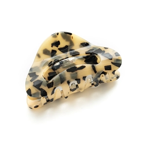 Leopard print tortoise shell acrylic hair claw clip with hollow heart shape on white back