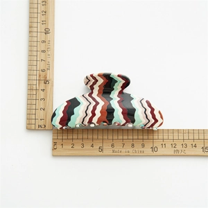 Large 10.5cm acetate hair claw clip with colorful wave patterns and vintage style