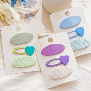 Handmade fabric hair clip set for girls with colorful heart and stripe patterns