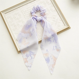 Detail of lavender watercolor floral chiffon scrunchie with elegant long ribbons