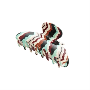 Elegant large acetate hair claw clip with colorful wave pattern for women's hairstyling