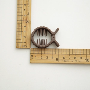 Pince à cheveux circulaire marron pour queue de cheval avec dents de maintien, 4,2 cm de diamètre