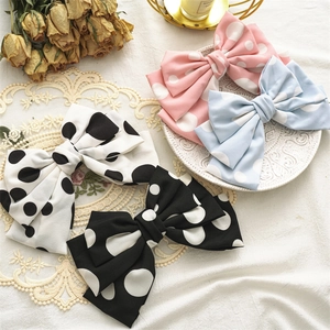Elegant triple-layer polka dot bow hair clips in multiple pastel colors and light fabric