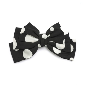Elegant triple-layered black fabric hair clip with white polka dots for women