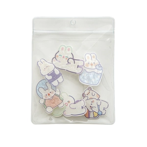 Lot de 6 pinces à cheveux ours et lapin avec paillettes dans un emballage clair