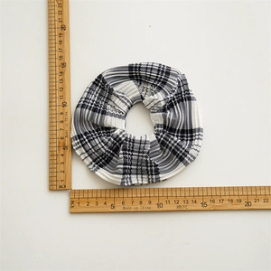 Classic black and white checkered pleated scrunchie hair accessory for women