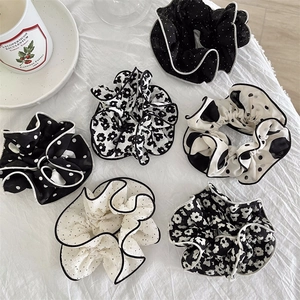Set of six elegant French floral scrunchies with contrast edging and polka dot patterns