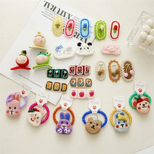 Handmade knitted wool flower and animal hair clips for girls featuring cute bear designs