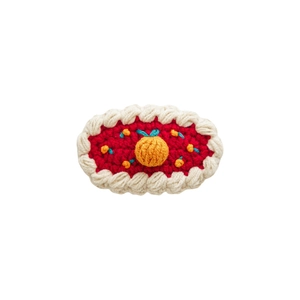 Barrette à cheveux au crochet faite main avec motif orange et base rouge à bordure blanche