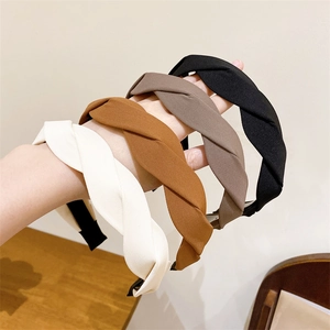 Elegant twisted fabric headband set in four neutral colors for women's hair styling