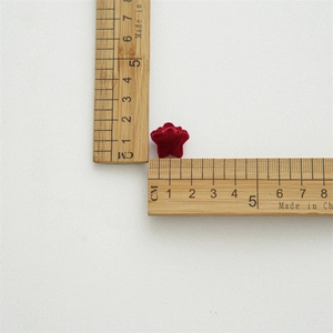 Mini red velvet star hair claw clip for women, measuring 1.5cm in diameter