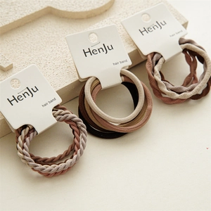 Set of 5 minimalist elastic hair bands in assorted earth tones and braided textures