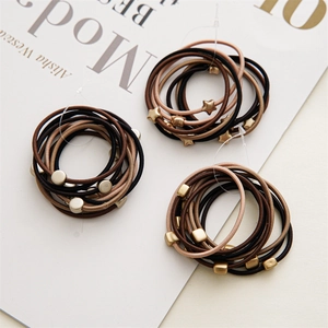 Set of 10 minimalist elastic hair ties in coffee tones with elegant geometric metal charms