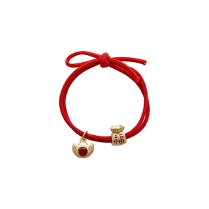 Bracelet tressé rouge du Nouvel An chinois avec breloques dorées en forme de lingot