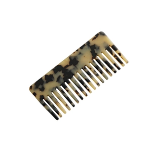 Pettine per capelli a denti larghi in acetato con elegante motivo a tartaruga