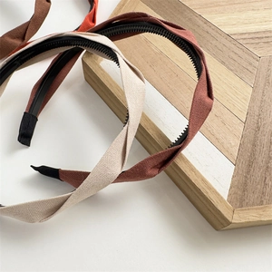 Detailed macro view of woven fabric texture and anti-slip teeth on a stylish headband