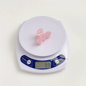 Pinza para el pelo rosa gelatina para coleta alta en báscula con peso de 9,9g