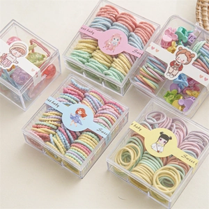 Coffret d'élastiques et pinces à cheveux enfants macaron dans des boîtes Sweet Baby