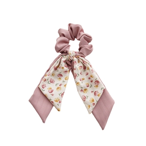 Floral fabric bow scrunchie with long ribbons in soft pink and cream for women