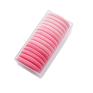 Set de gomas para el pelo sin costuras con degradado rosa en caja de plástico