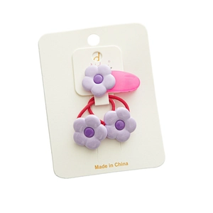 Lot de barrettes fleurs violettes et élastiques rouges pour filles sur carte blanche