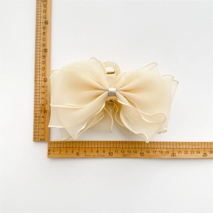 Grande pince à cheveux élégante avec nœud en organza crème de 15 cm pour les femmes