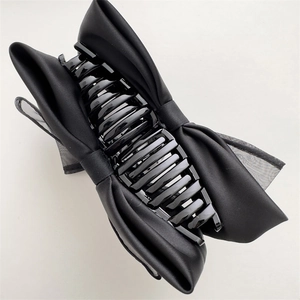 Elegant large black double-layered bow hair claw clip with satin and mesh textures