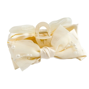 Creamy satin and organza bow shark hair claw with elegant pearl embellishments