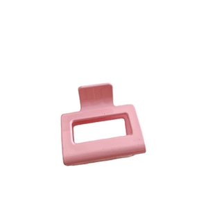 Pinza per capelli rettangolare in resina rosa crema opaca con design moderno e cavo