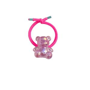 Pink elastic hair tie with transparent purple gummy bear charm for girls hair styling
