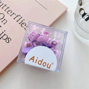 Mini pinces à cheveux en dégradé de violet et rose mat dans une boîte cadeau transparente
