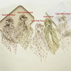 Five-pack of floral chiffon scrunchies with long streamers in pastel spring colors
