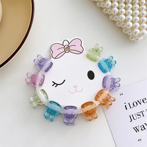 Detail of 10-piece mini glitter rabbit hair claws in various pastel macaron colors