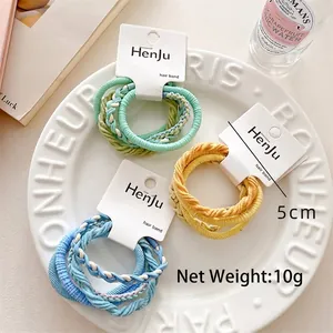 Five-piece set of high elasticity candy-colored hair ties in a stylish ceramic dish