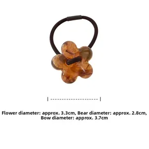 Detailed size specifications for flower, bear and bow resin hair tie charms