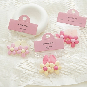 Cute pink flower hair clips set for women with stylish matte finish and pearl accents