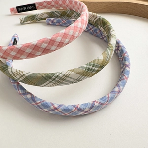 Three pieces of sweet plaid fabric headbands in pink, green, and blue candy colors