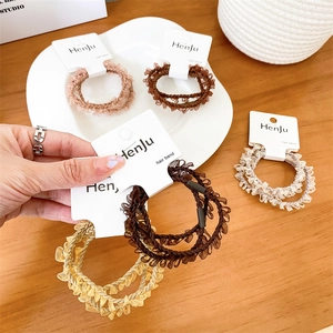 Five-piece luxury hair band set with elegant lace trim in earthy tones for women