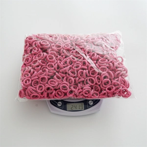 Bulk pack of pink elastic mini hair ties for kids, weighed at 241g in a sealed bag