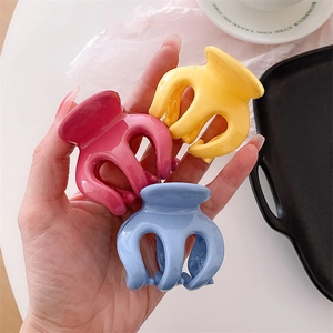 Lot de trois mini pinces à cheveux citrouille en couleurs rose, jaune et bleu vif