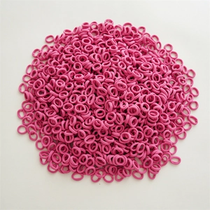 Detail showing macro fiber texture of rose red high elastic seamless mini hair bands