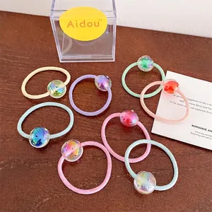 Lot de 8 élastiques à cheveux pour enfants avec perles irisées sur fond en bois