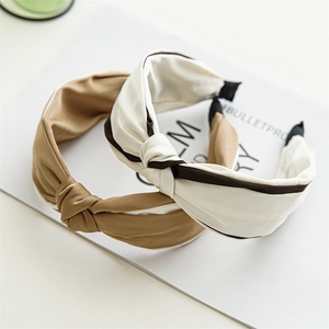 Elegant knotted satin headbands in khaki and cream with minimalist french style