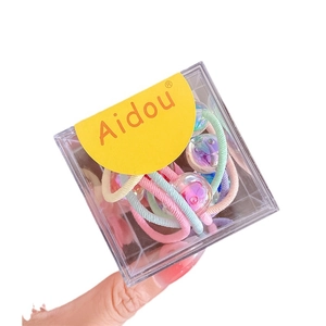 Élastiques à cheveux macaron pour enfants avec perles irisées dans une boîte transparente