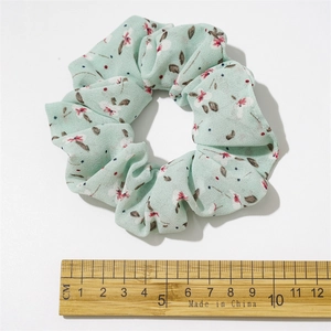 Floral chiffon scrunchie in mint green with delicate pink flowers, 10cm diameter