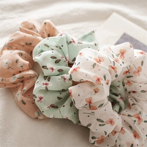Floral chiffon scrunchie set in pink, green, and white for elegant summer hairstyles