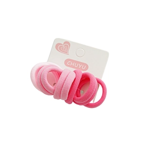 Roze hoogelastische haarelastiekjes set voor kinderen op een kaartje