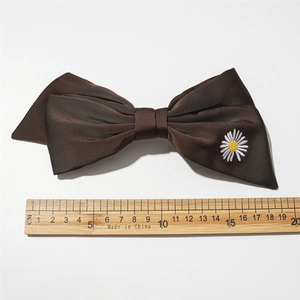 Dark brown satin bow hair clip with daisy embroidery and spring clip, 19cm wide