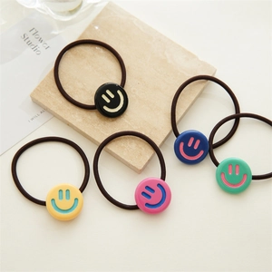 Five-pack of cute smiley face elastic hair ties in vibrant colors with high-stretch bands