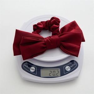 Elegant deep red satin double-layer bow scrunchie showing product weight of 20.2g